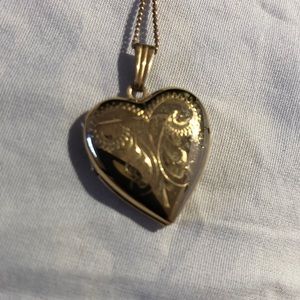 Heart shaped pedant with inside for photos